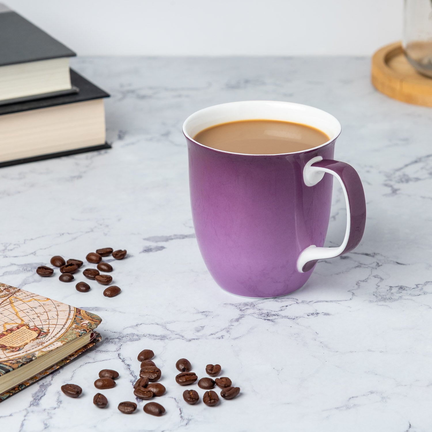 Aubergine Java Mug in fine bone china, lifestyle image styled on countertop with coffee