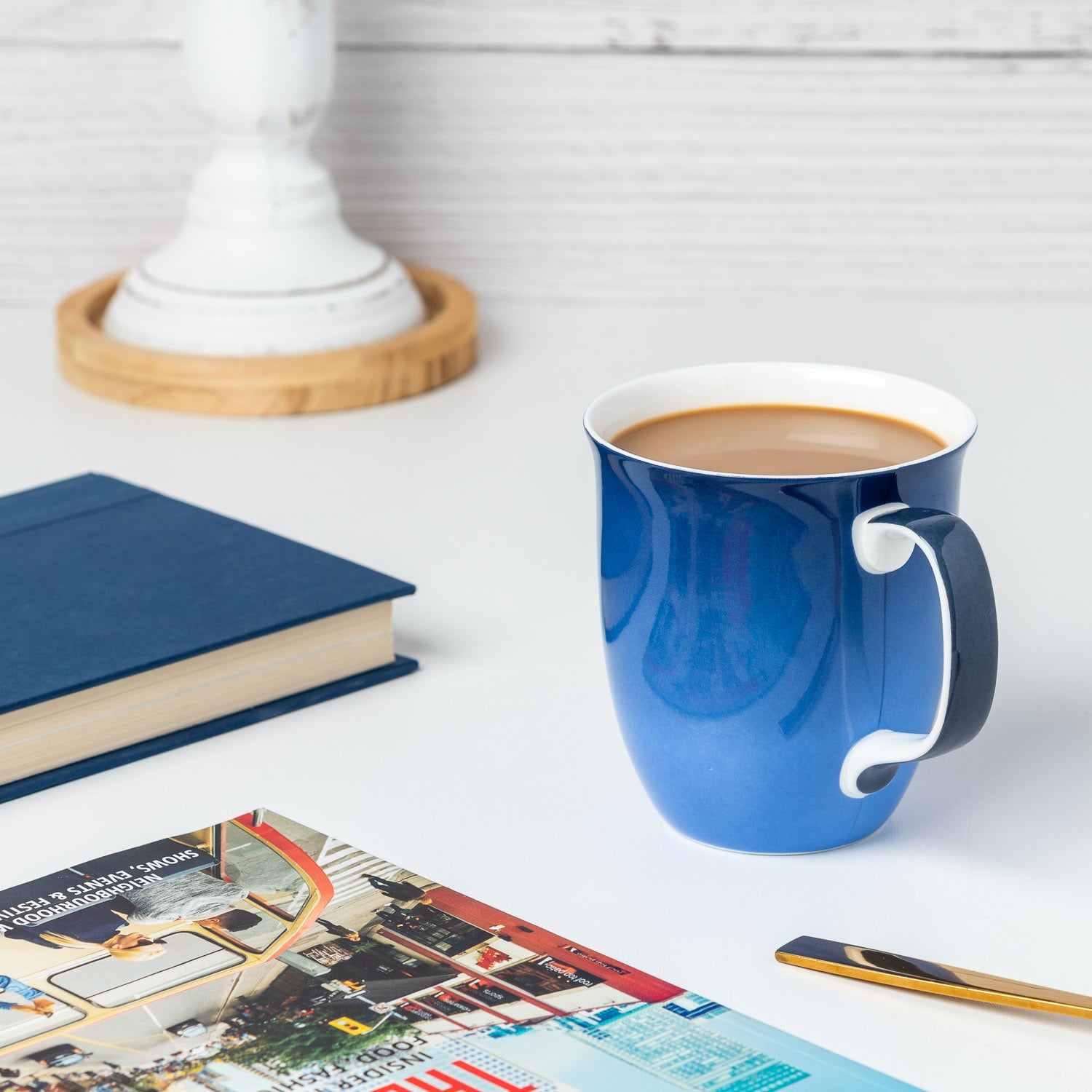 Cobalt Blue Java Mug in fine bone china, lifestyle image styled on Countertop with coffee