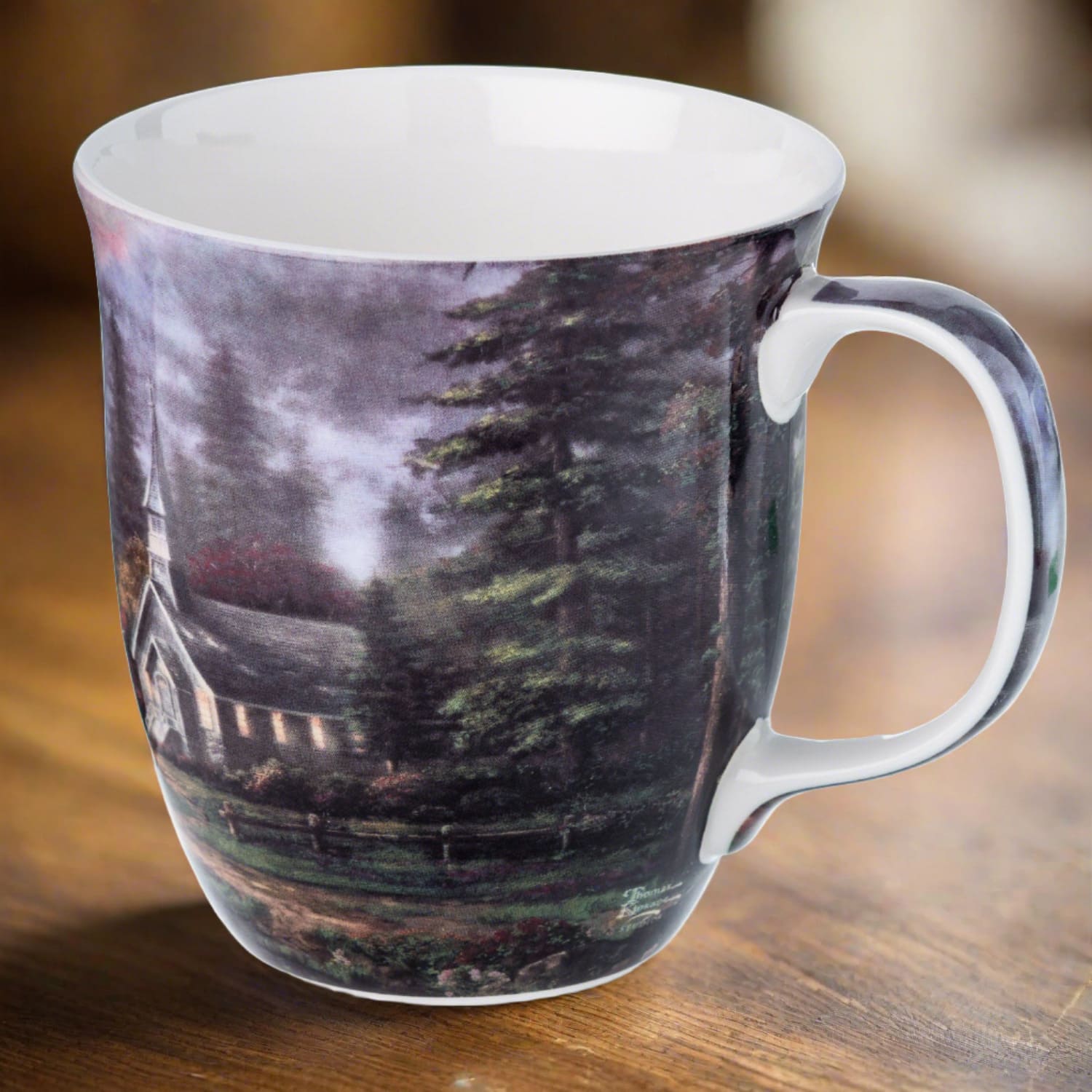 Kinkade Valley Chapel Java Mug, lifestyle image styled on a dining table
