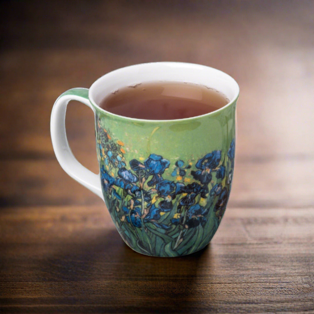 Van Gogh Irises Java Mug, lifestyle image styled on a dining table with tea