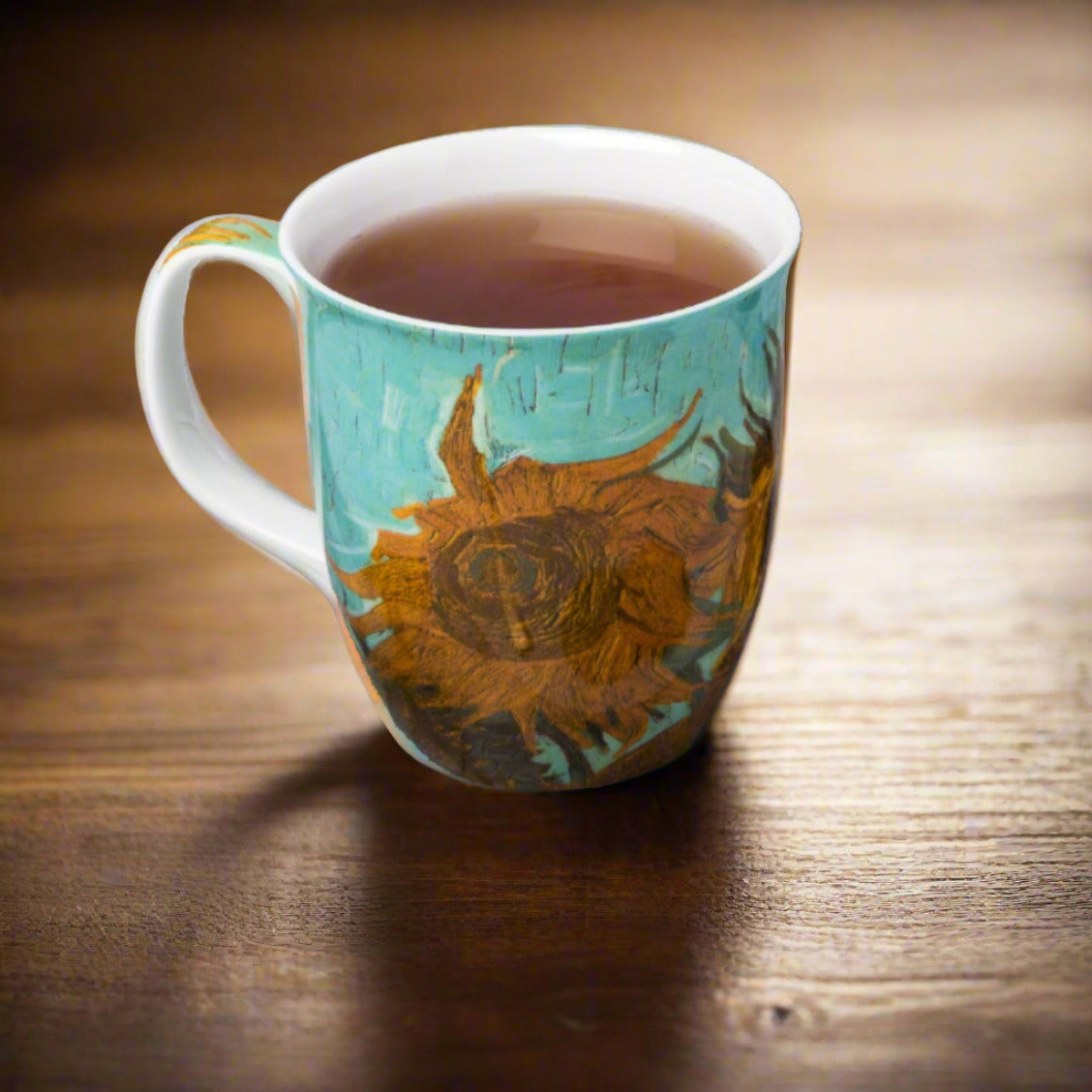 Van Gogh Sunflowers Java Mug, lifestyle image styled on a dining table with tea