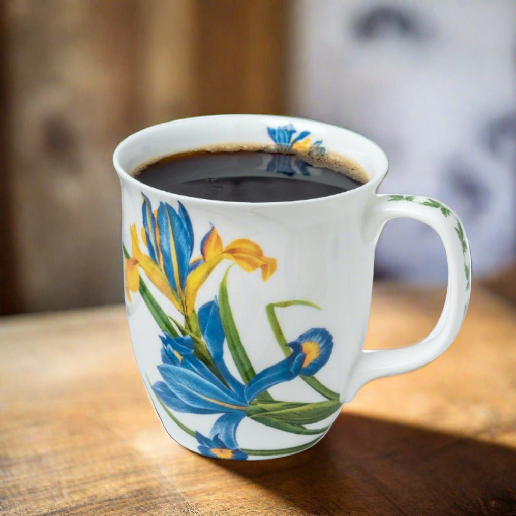 Botanical Flowers Garden Iris Java Mug, lifestyle image styled on a dining table with coffee