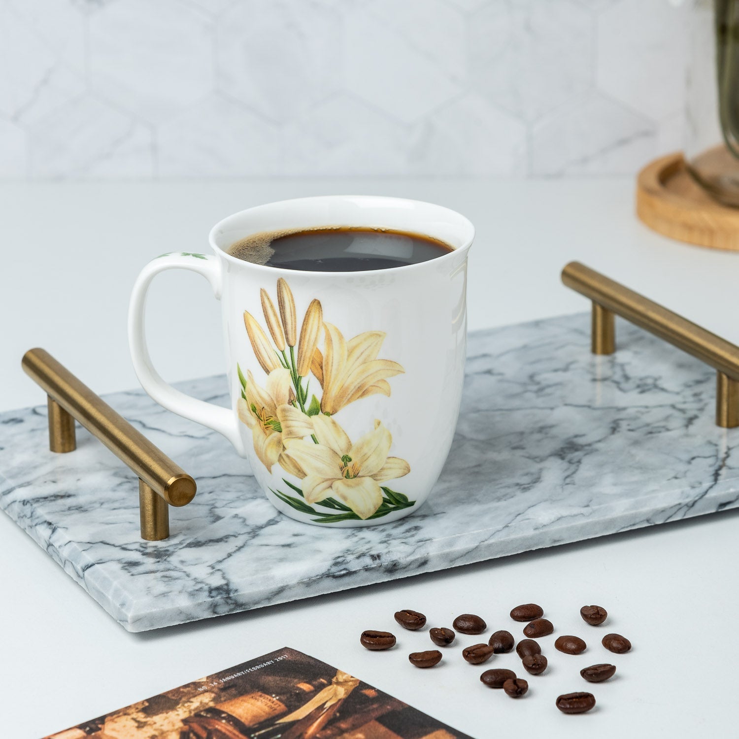 Botanical Flowers Lily Java Mug lifestyle image styled on a countertop with coffee