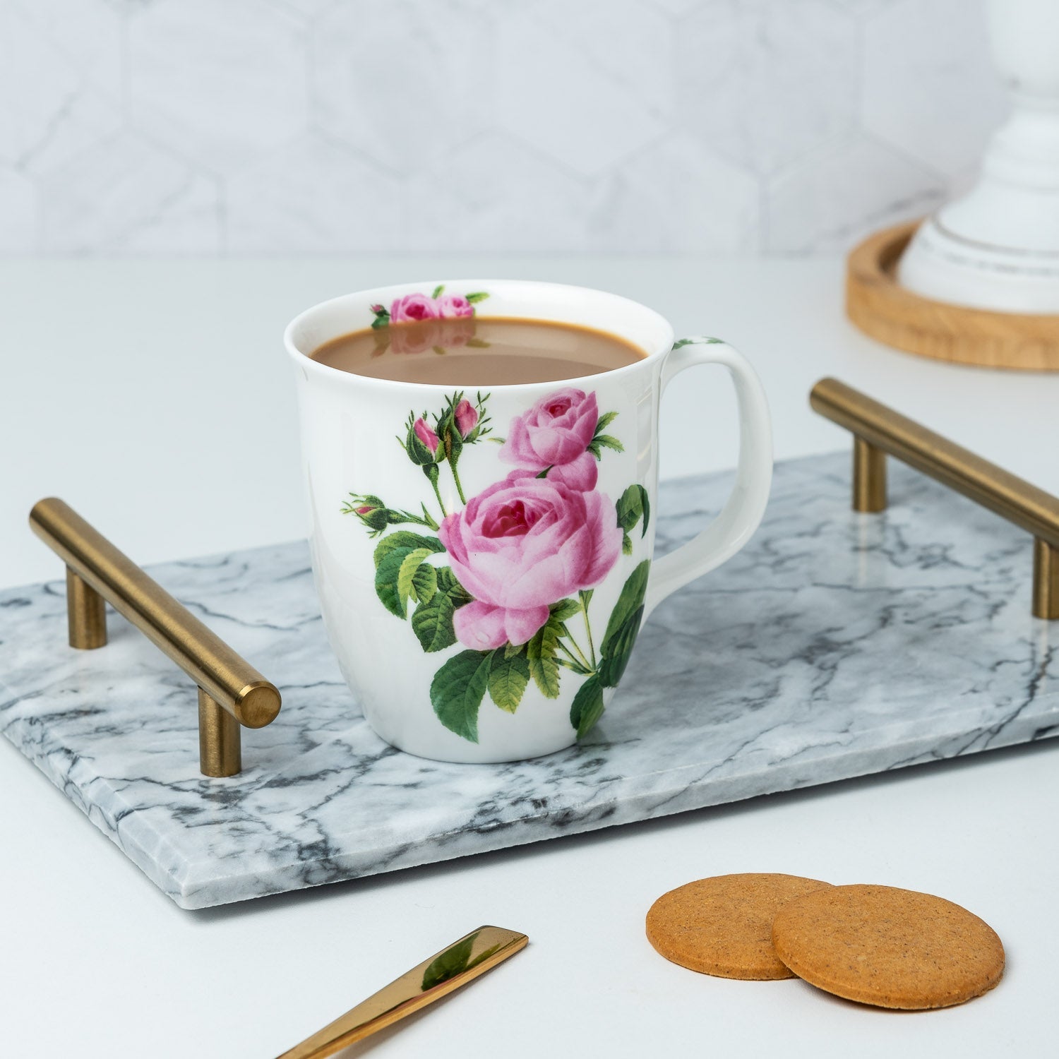 Botanical Flowers Pink Rose Java Mug, lifestyle image styled on a countertop with coffee and cookies