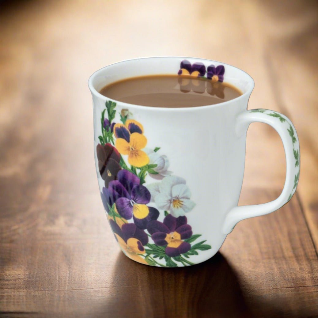 Botanical Flowers Viola Java Mug, lifestyle image styled on a dining table with coffee