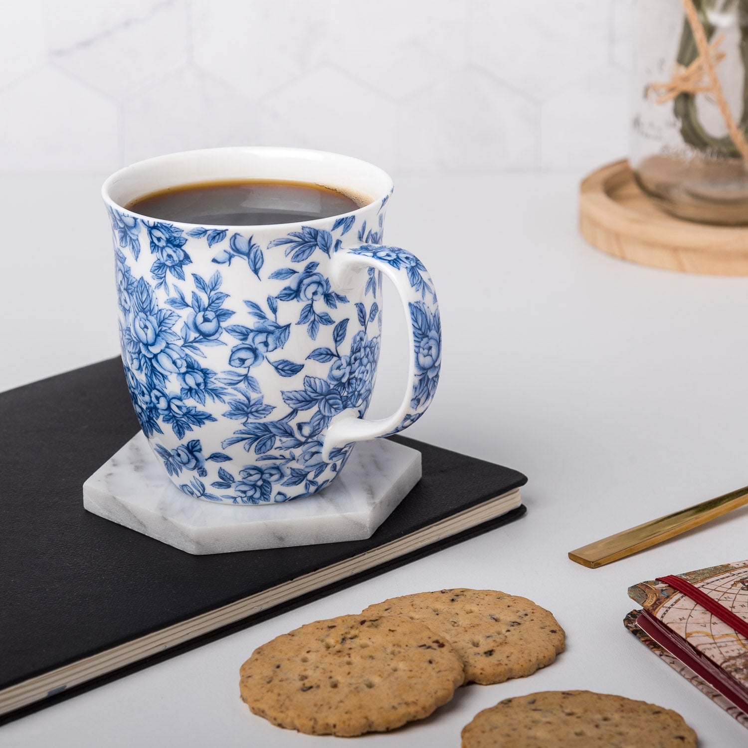 Chintz Light Blue Roses Java Mug, lifestyle image styled on a countertop with coffee