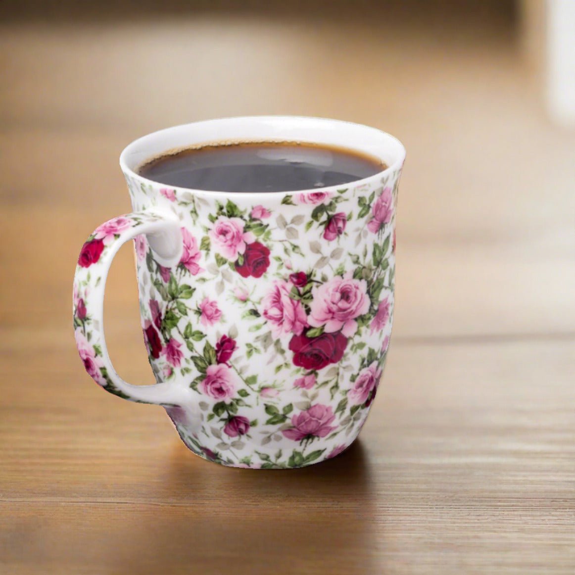 Chintz Red & Pink Roses Java Mug, lifestyle image styled on a dining table with coffee