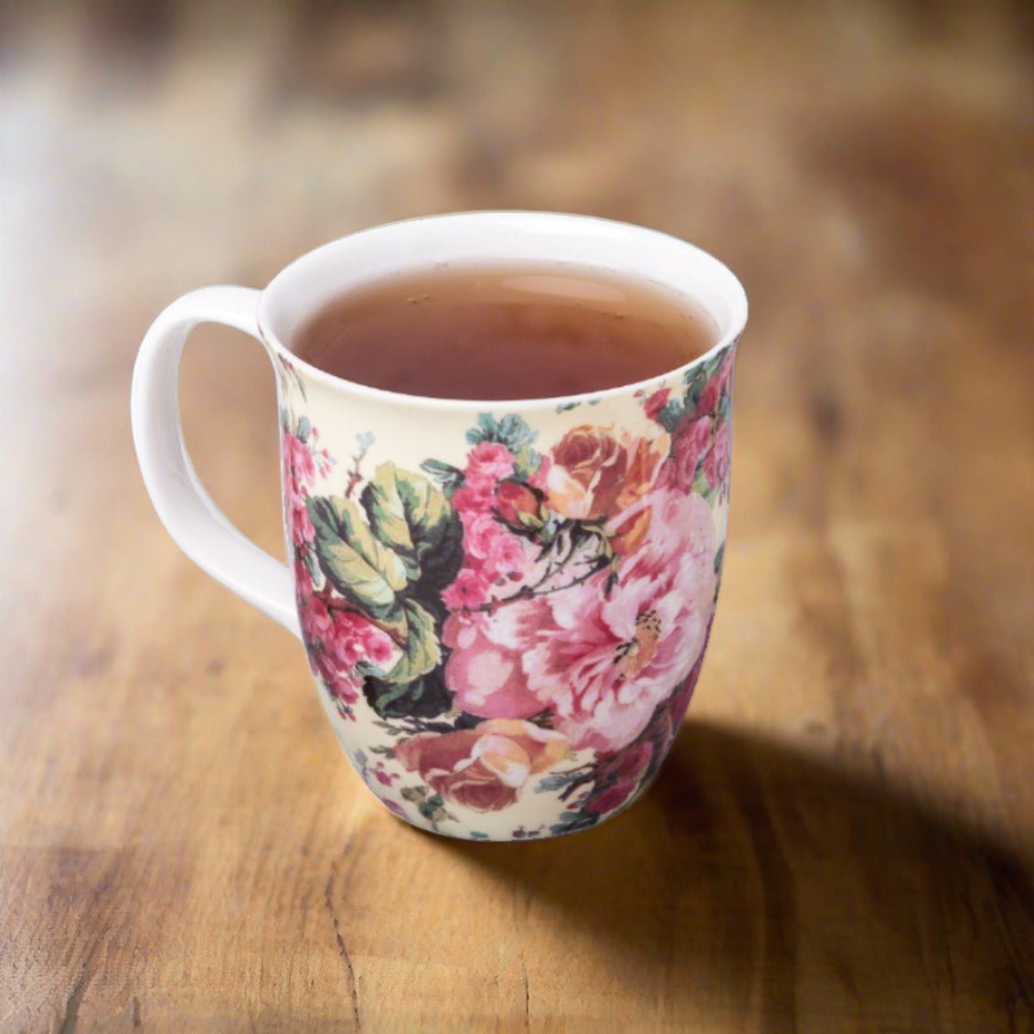 Chintz Rose Bouquet Java Mug, lifestyle image styled on a dining table with tea