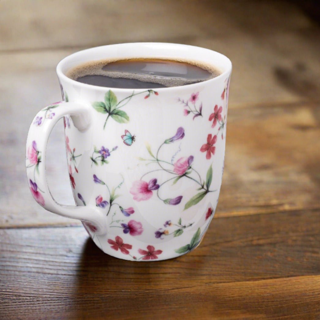 Chintz Sweet Pea Java Mug, lifestyle image styled on a dining table with coffee