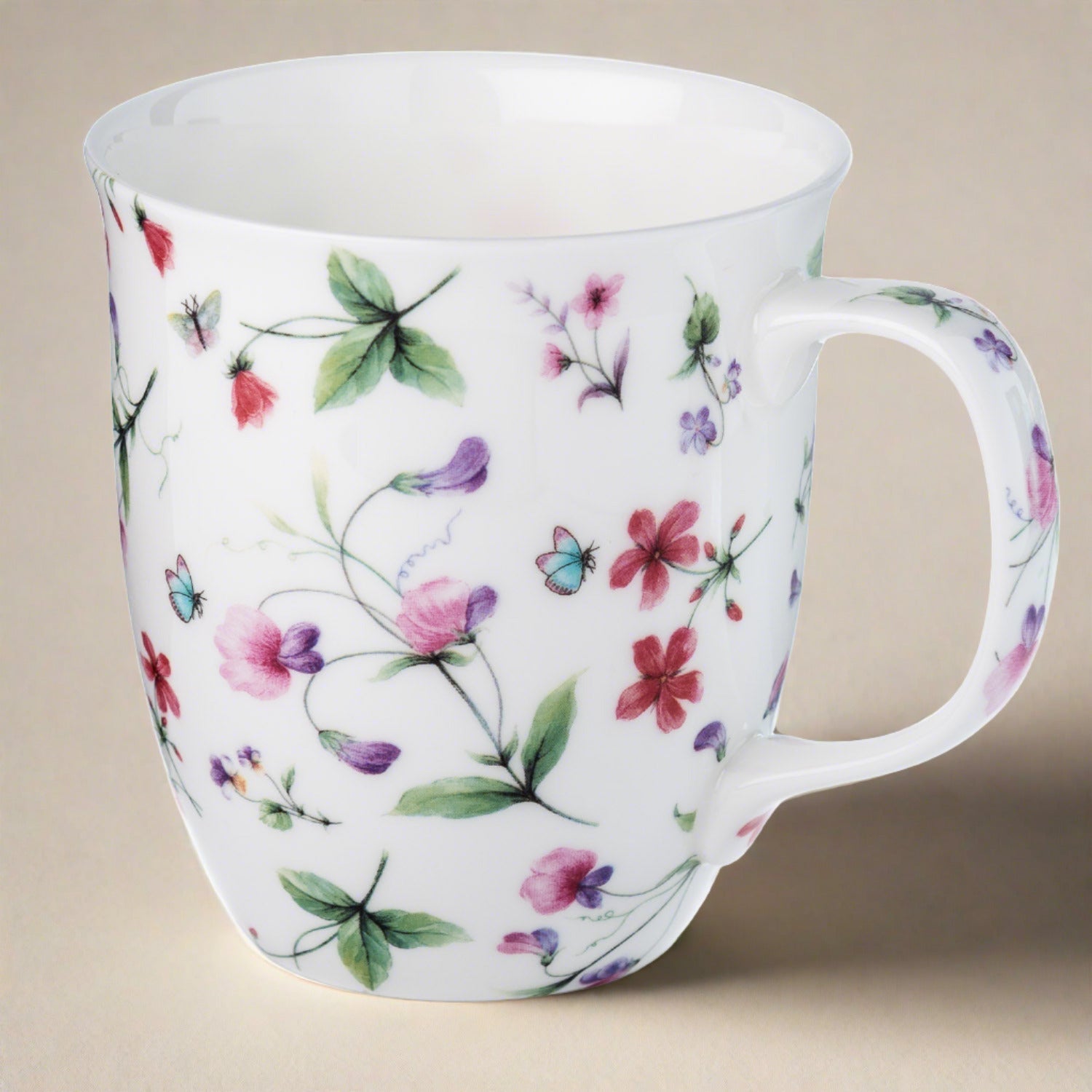 Chintz Sweet Pea Java Mug in fine bone china, front view, handle right, beige background