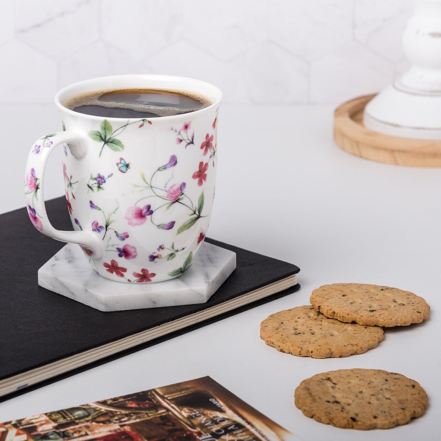 Chintz Sweet Pea Java Mug, lifestyle image styled on a countertop with coffee