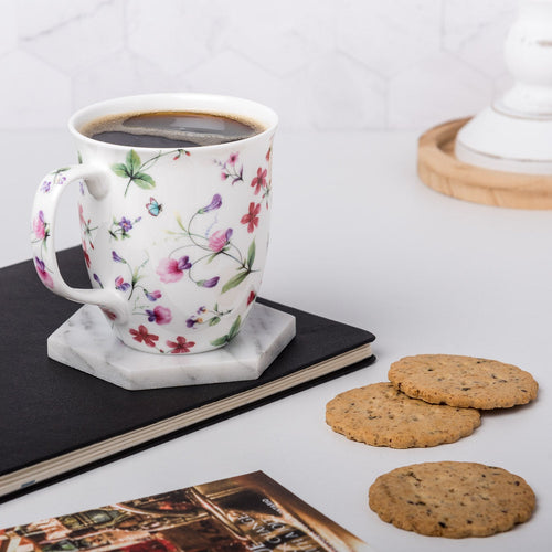 Chintz Sweet Pea Java Mug, lifestyle image styled on a countertop with coffee