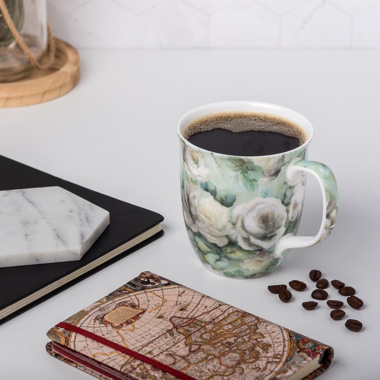 Chintz White Roses Java Mug, lifestyle image styled on a countertop with coffee