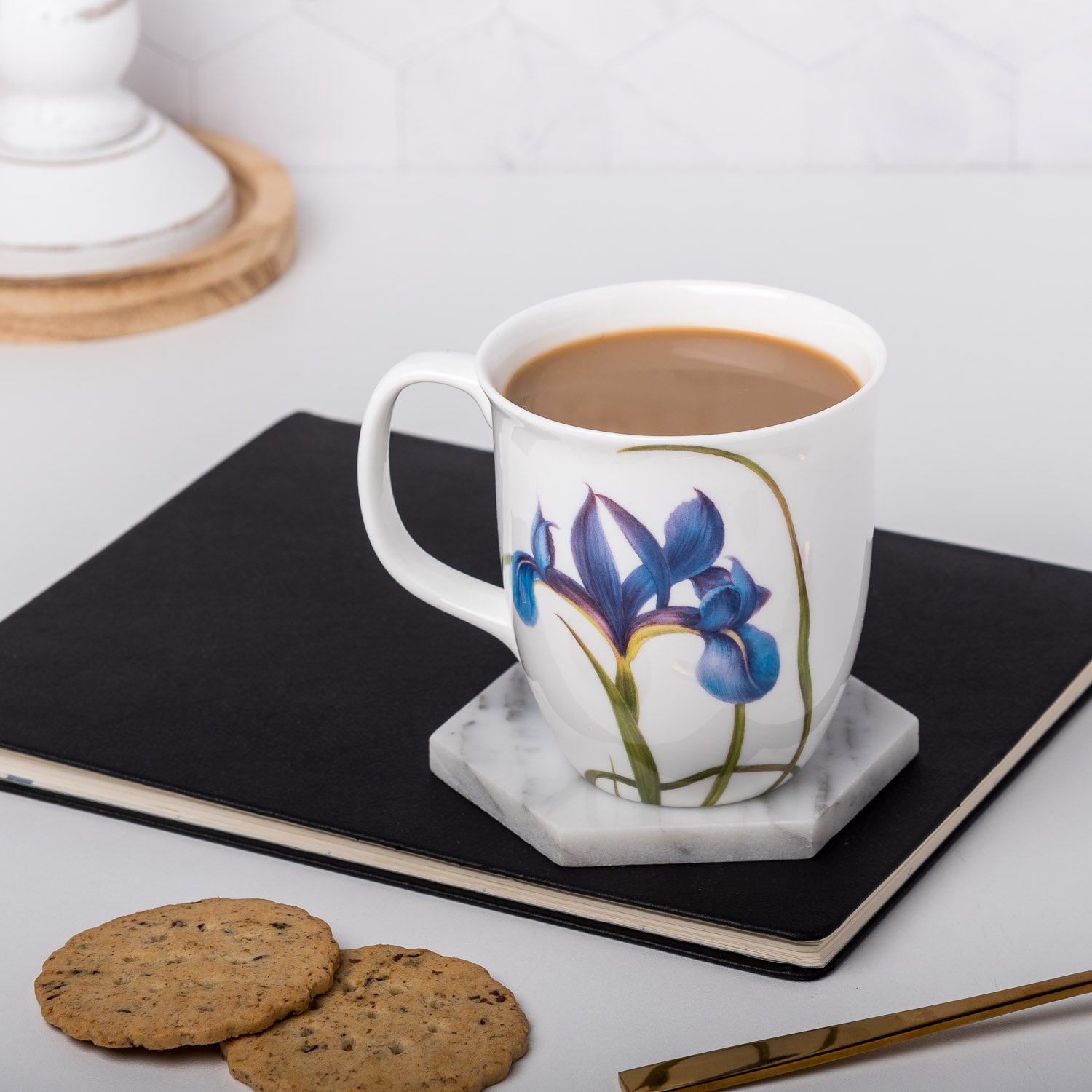Garden Collection Blue Iris Java Mug, lifestyle image styled in a kitchen with mocha and bisquits