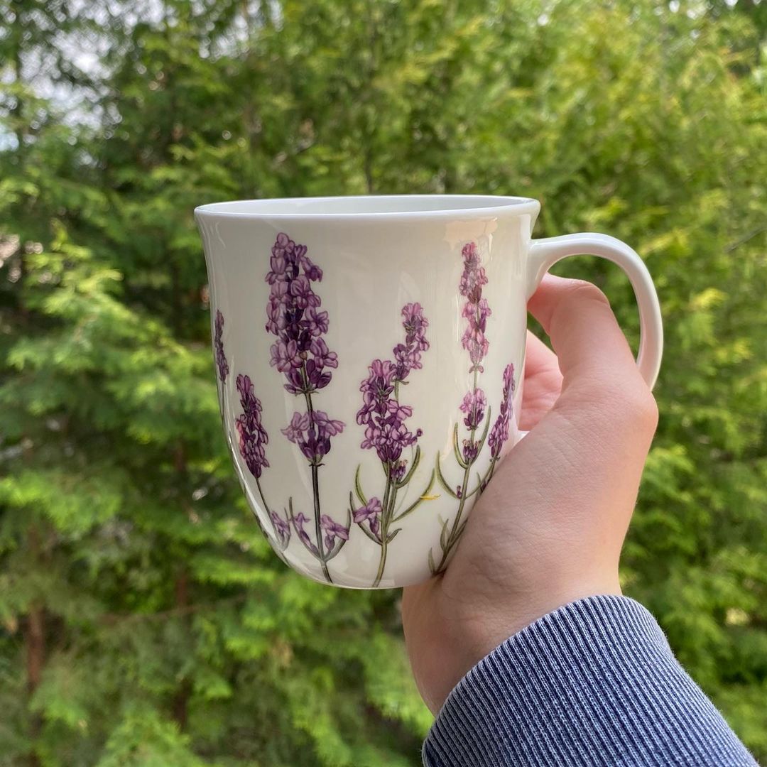 Garden Collection Lavender Java Mug, lifestyle image styled in a garden, shown in hand