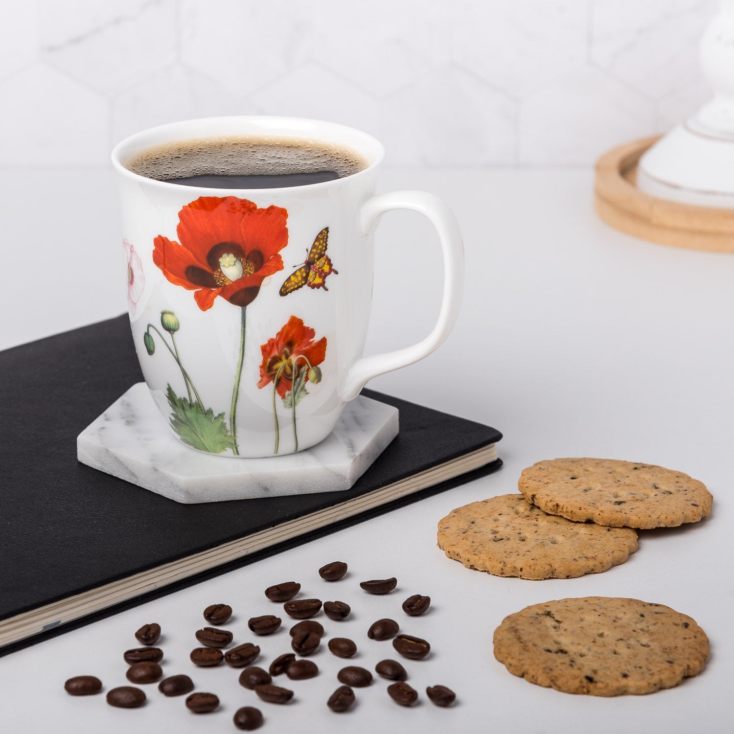 Garden Collection Poppies Java Mug, lifestyle image styled on a countertop with coffee