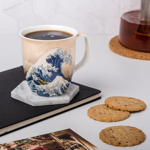Hokusai The Great Wave Java Mug, lifestyle image styled on a countertop with coffee