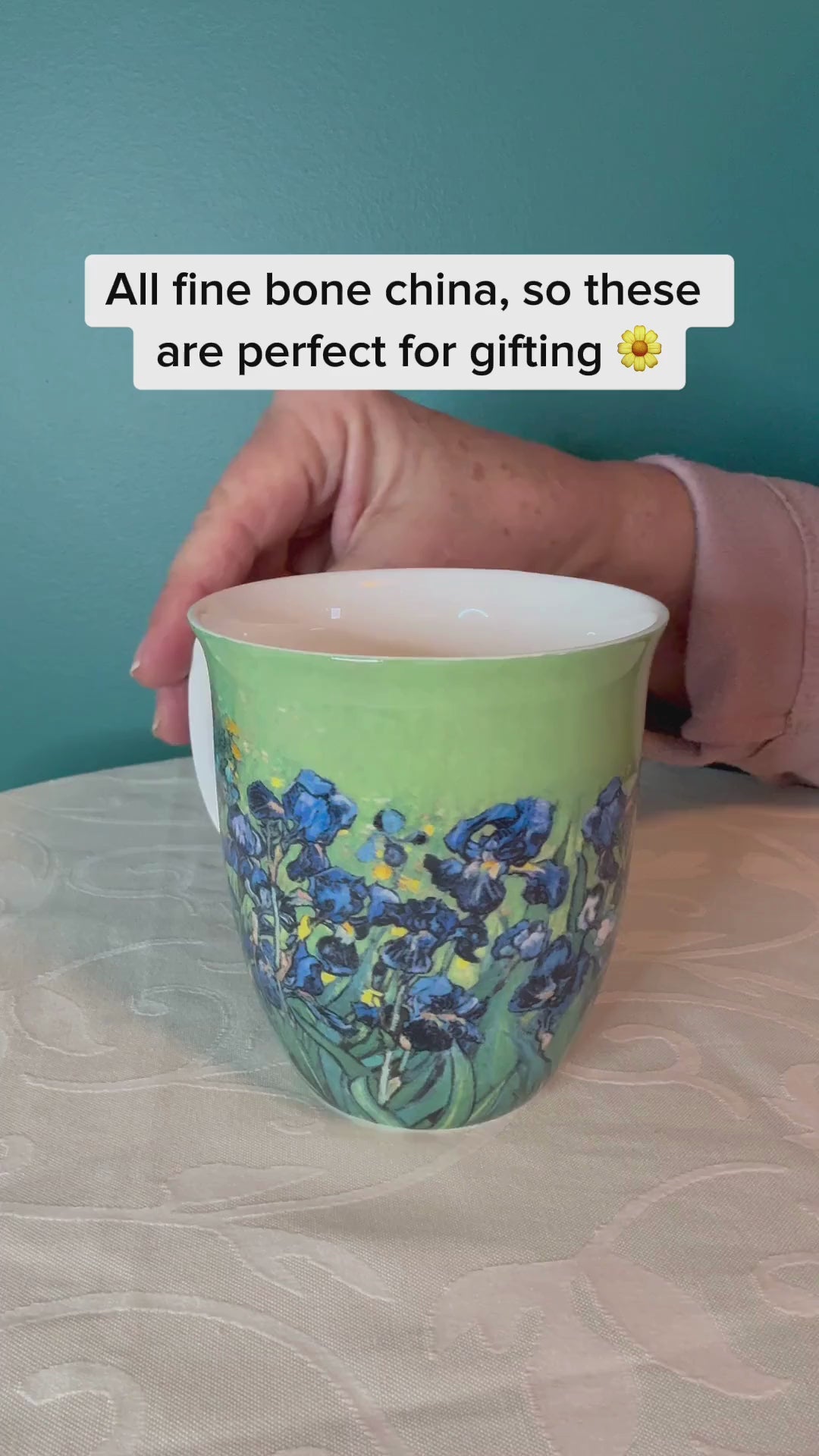 Van Gogh Irises Java Mug, product video preview, styled on a dining table with tea