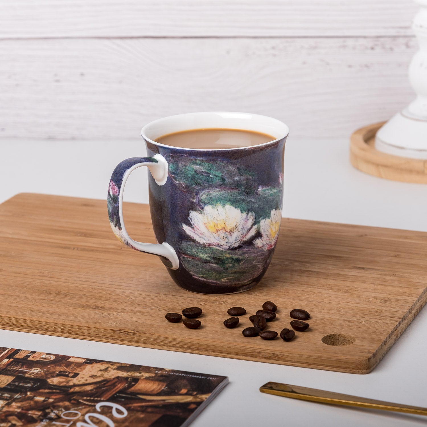Claude Monet Water Lilies Java Mug, lifestyle image styled on a countertop with coffee
