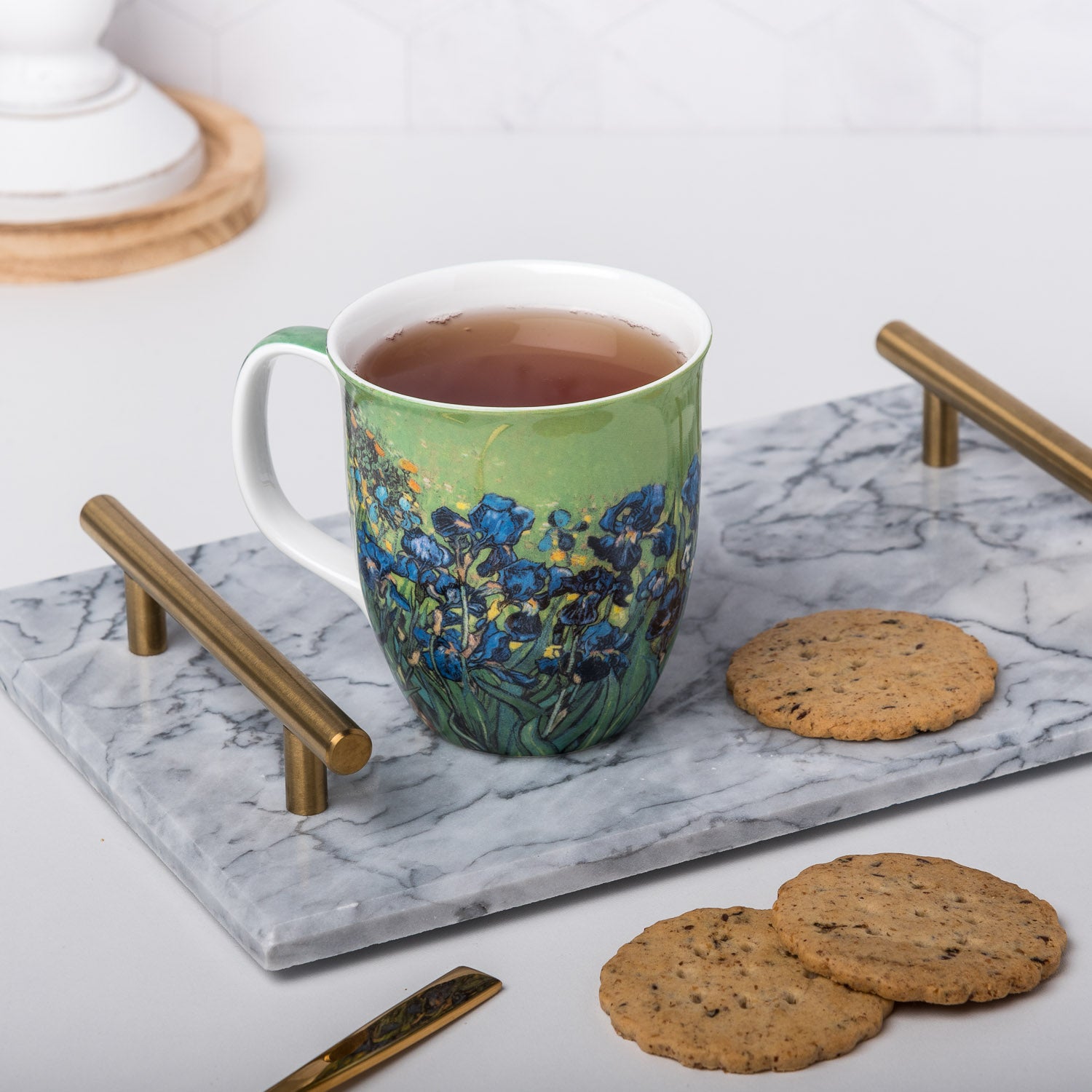 Van Gogh Irises Java Mug, lifestyle image styled on a countertop with tea