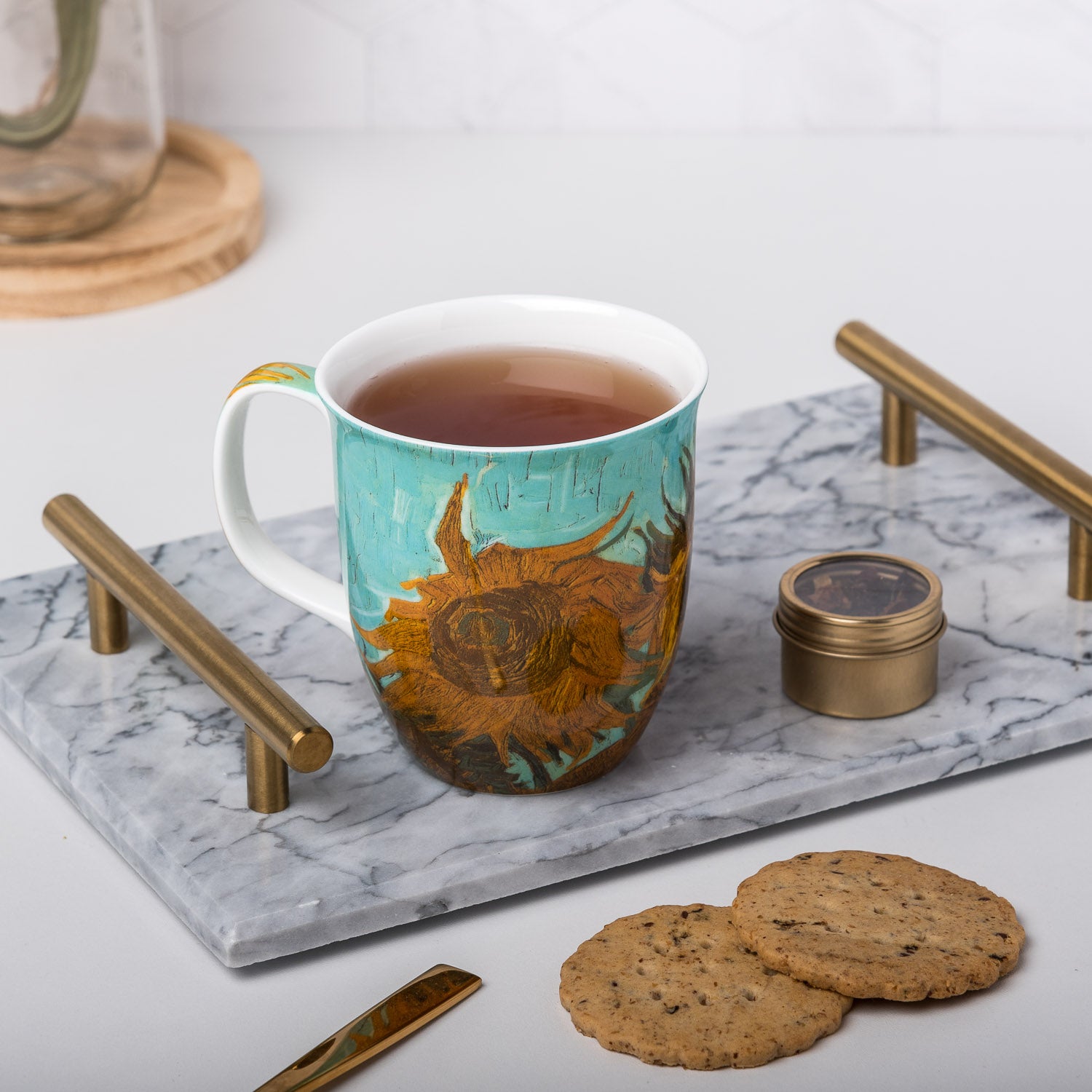 Van Gogh Sunflowers Java Mug, lifestyle image styled on a countertop with tea